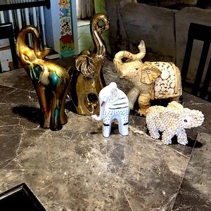 7 piece ELEPHANT COLLECTION. Twin elephants are shown in last 2 photos.